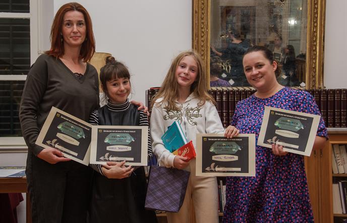 Pobjednice Nikol Šlingar i Marija Begović idu u Sisak na 8. državno Natjecanje u čitanju naglas